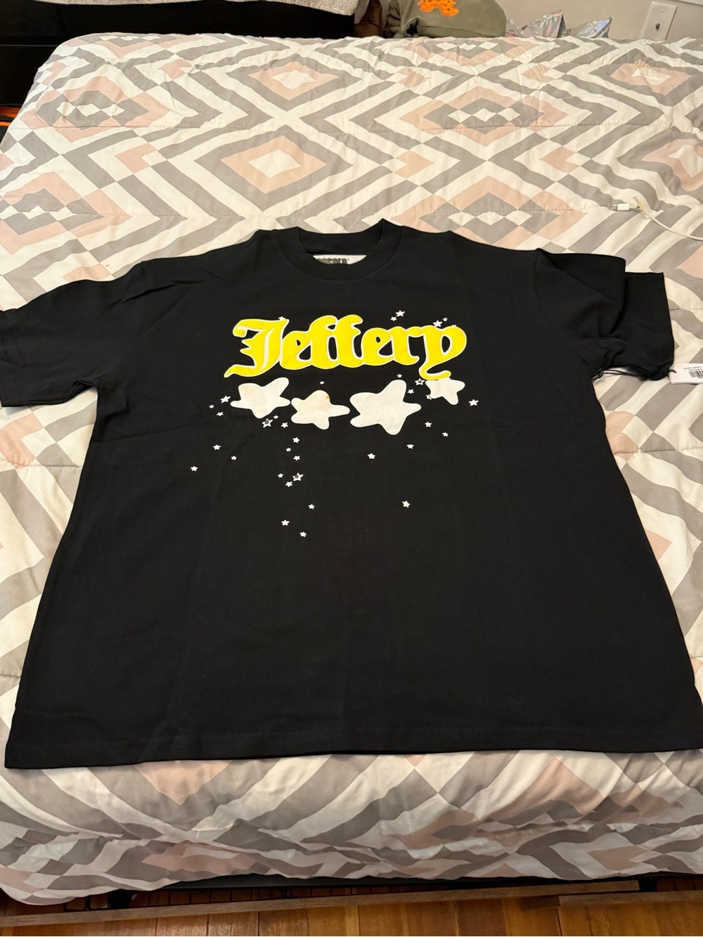 Sp5der Mens Black Short-Sleeve Tee with Yellow Logo and White Star Graphics
